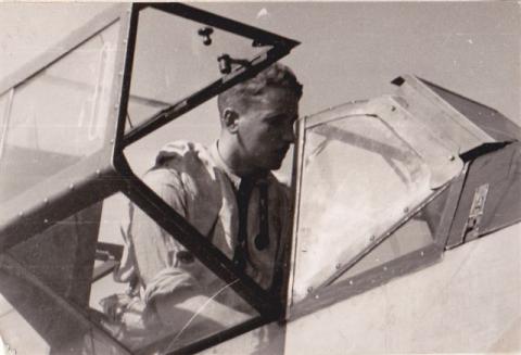 Oberleutnant Leopold Wenger, Jr in cockpit of fighter plane.