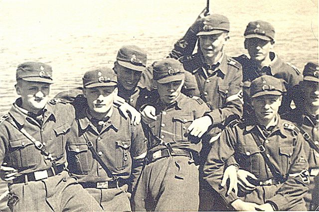 On a fishing boat from Kolberg Harbor; Bibi seated at far right, rear, with Gilbert directly in front of him.