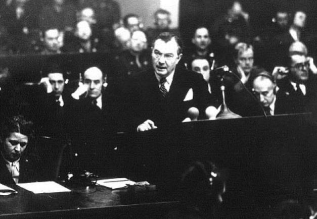 Chief Prosecutor for the United States Robert Jackson at Nuremberg making an aggressive case against the "Nazis."