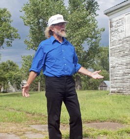 Craig Cobb stands on one of his lots on Main Street in Leith, ND, where he envisions a public park for White townspeople.