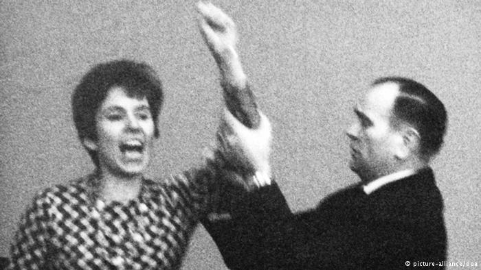 Beate Klarsfeld raises arm to hit Kiesinger