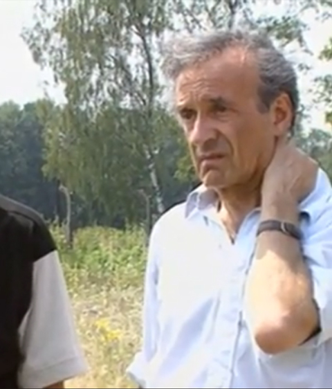 Elie Wiesel arm with no tattoo.