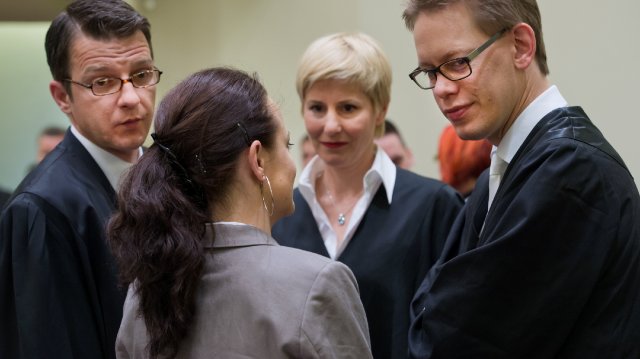 Wolfgang Stahl, Anja Sturm and Wolfgang Heer with their client in April 2013