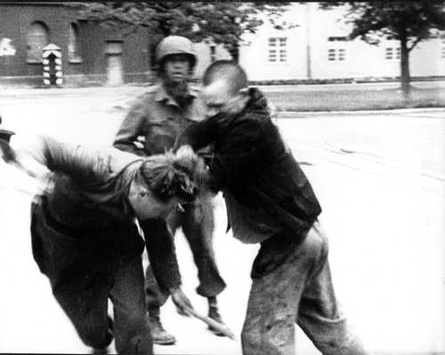 Freed prisoner fighting with German soldier (2)