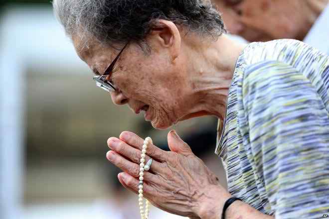 A survivor at a memorial service in Nagasaki, Japan