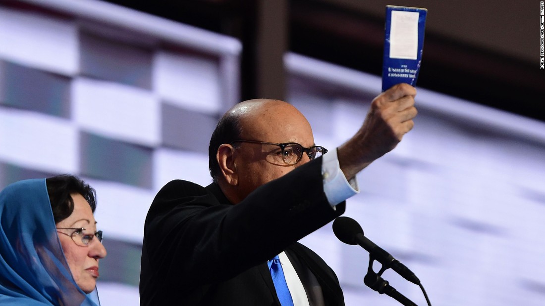 Khizr Khan holds up a pocket constitution during his speech to the Democrat National Convention