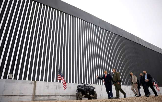 President Donald Trump inspects the newest section of the U.S.-Mexico border wall