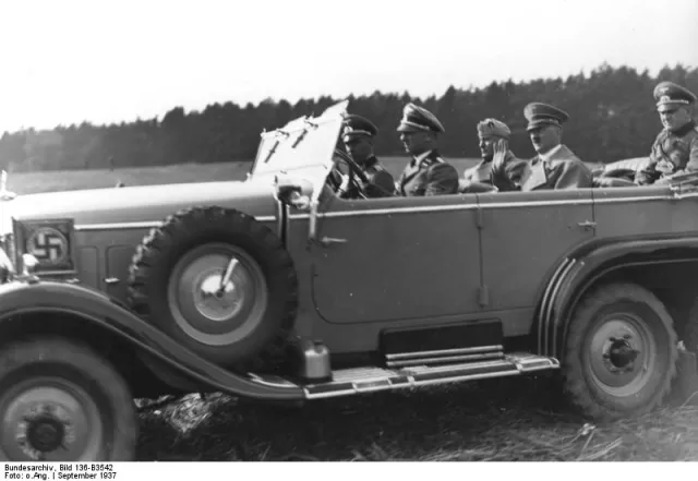 Adolf Hitler with Mussolini and his military adjutant Col. Hossbach