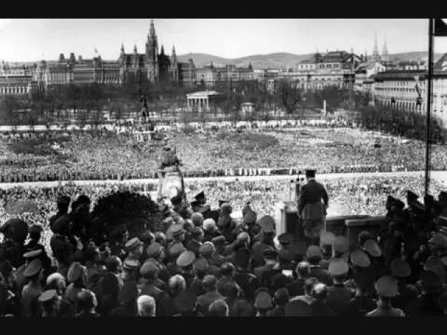 Hitler speaks to a massive crowd in the Heldenplatz in Vienna.
