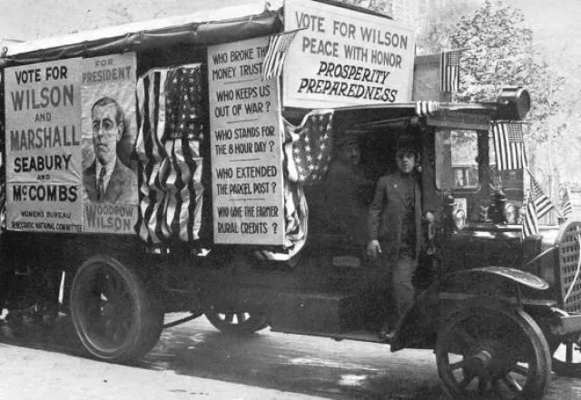 A Wilson campaign truck spouting empty slogans.